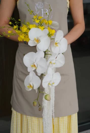 White Orchid and Oncidium Cascade Bridal Bouquet — photo 1